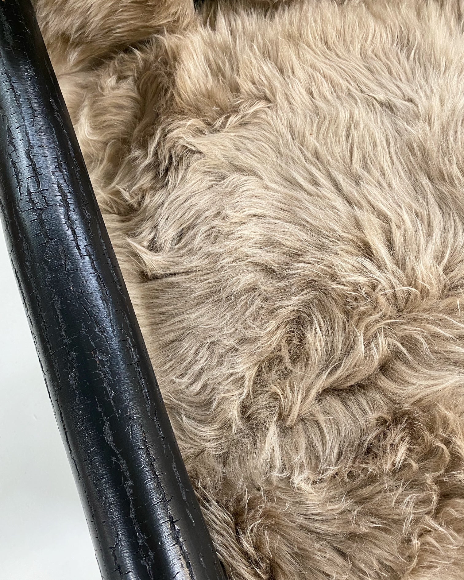 Black Butte Chair and Ottoman with Sheepskin Cushions - Image 6