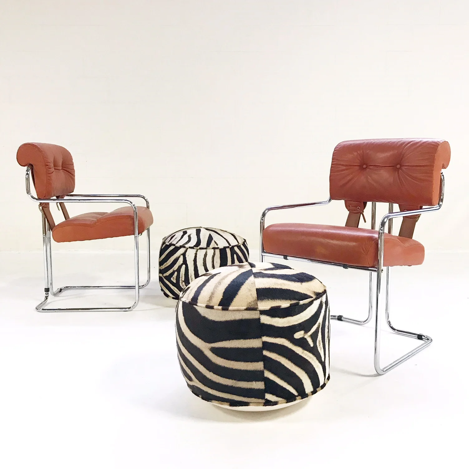 Tucroma Chairs with Zebra Hide Pouf Ottomans
