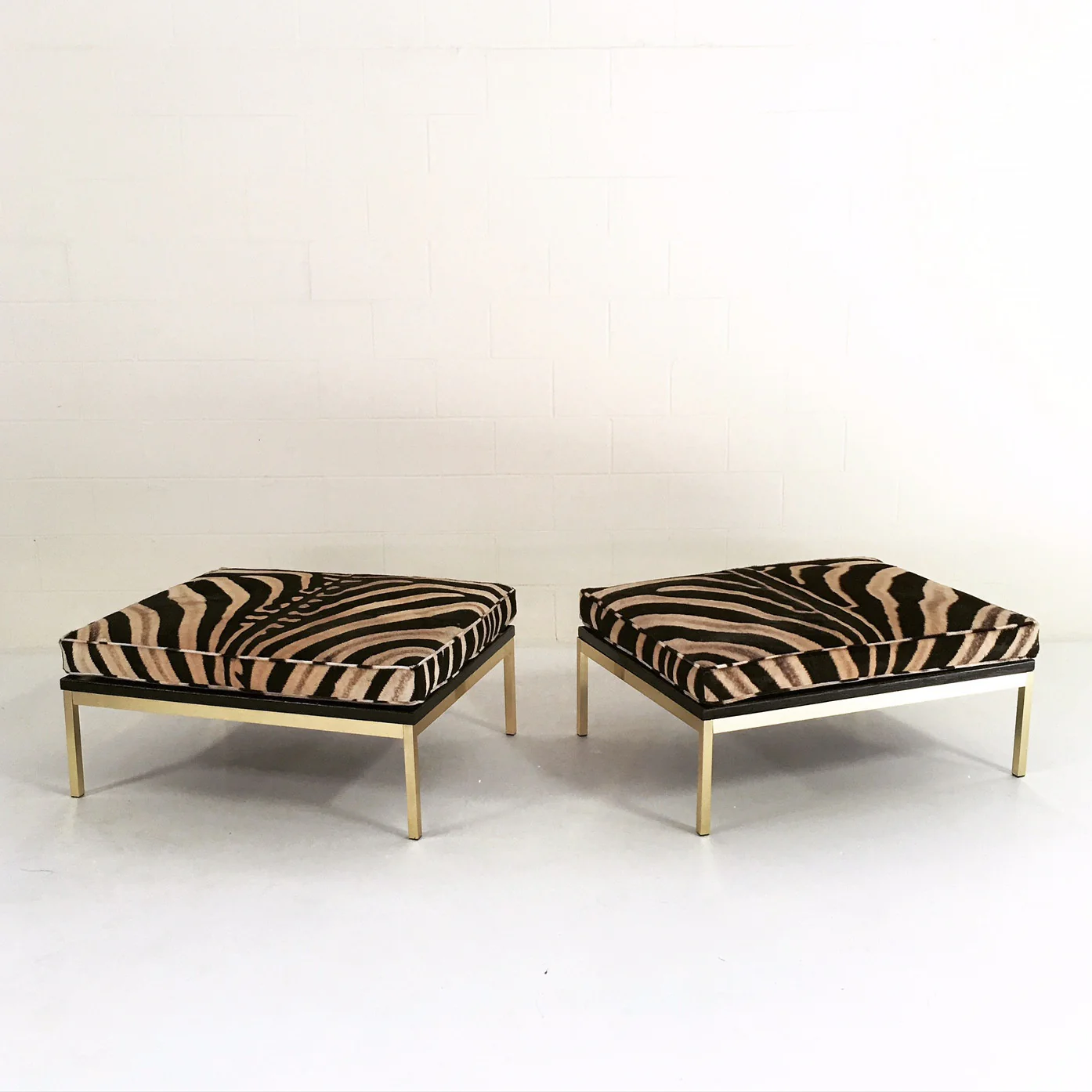 Knoll Style Zebra Hide and Brass Ottomans, pair