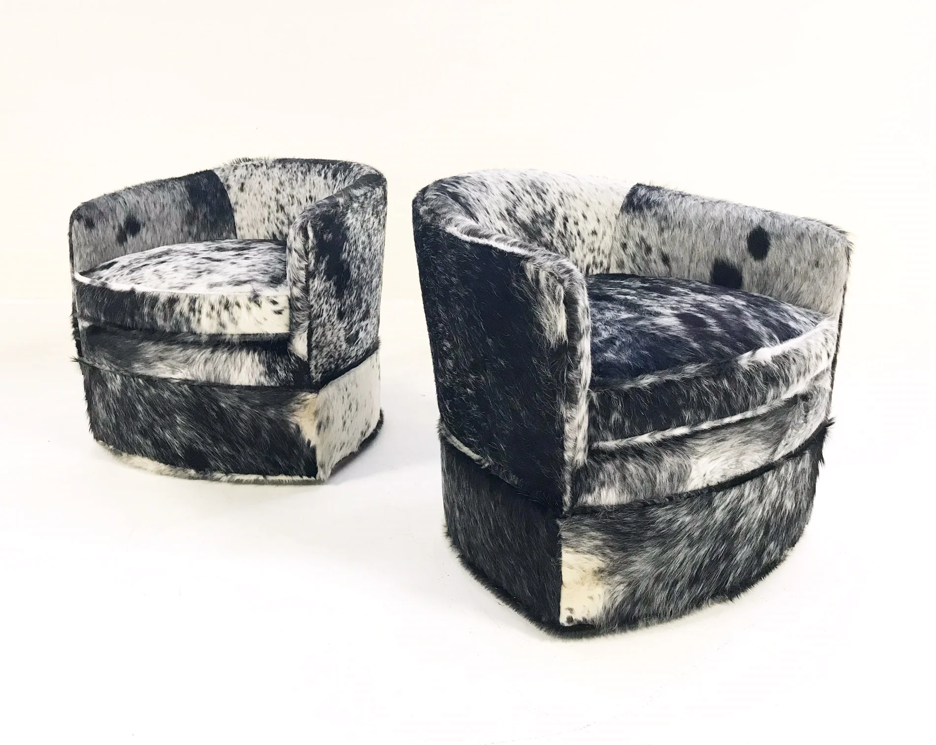 Wheeled Slipper Chairs in Brazilian Cowhide, pair