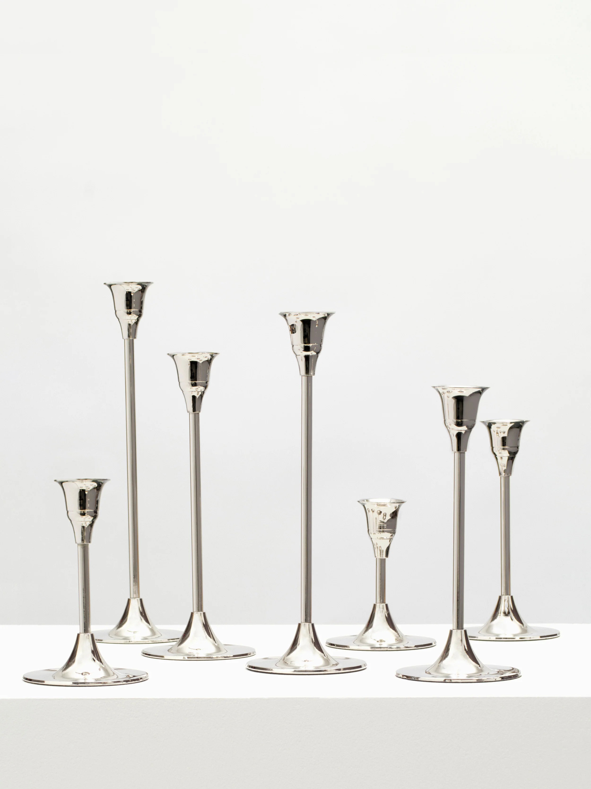 Candlesticks of Various Sizes, Set of 7 - Nickel