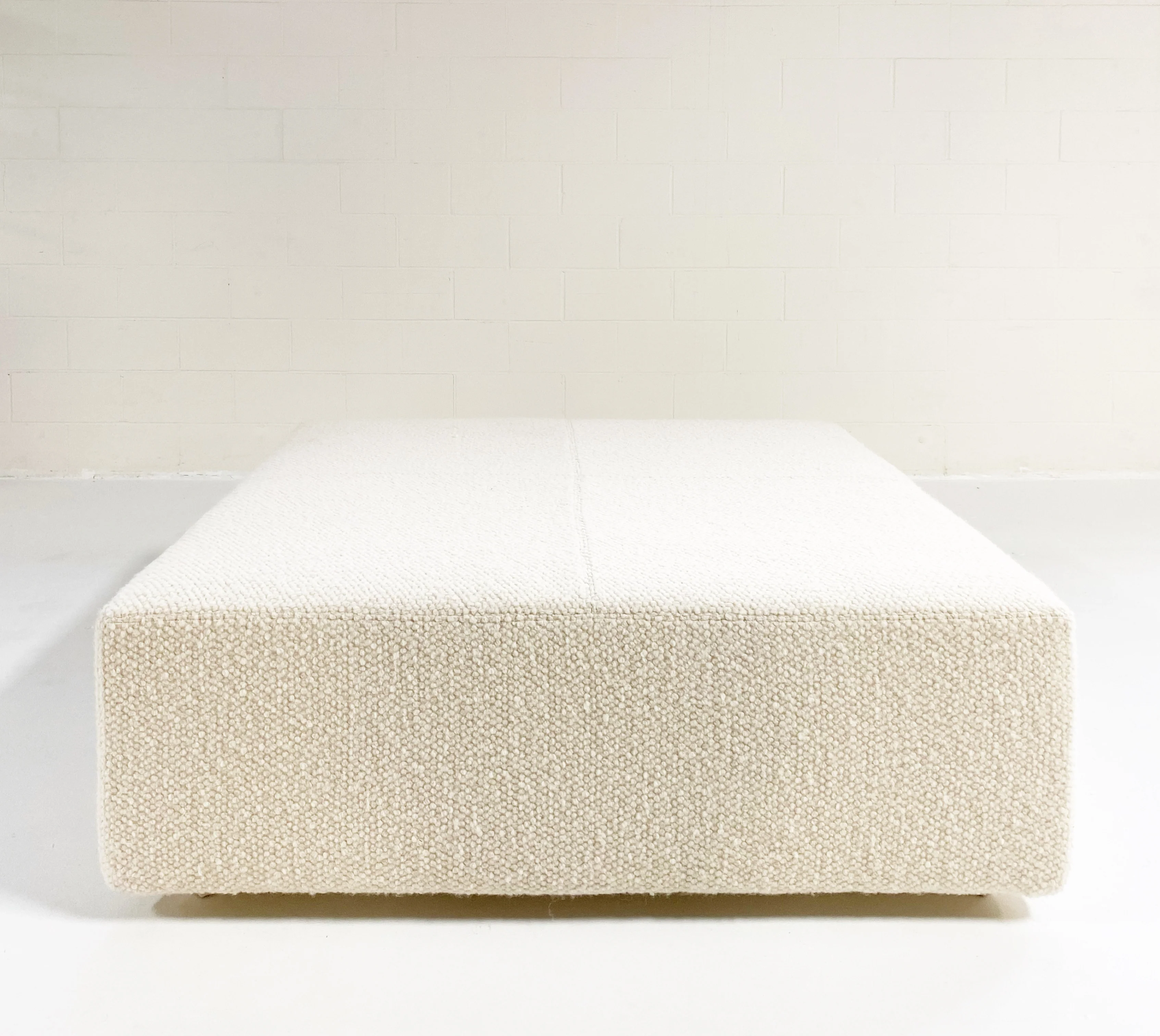 The Forsyth Ottoman in Dedar Boucle, 54 x 54 in