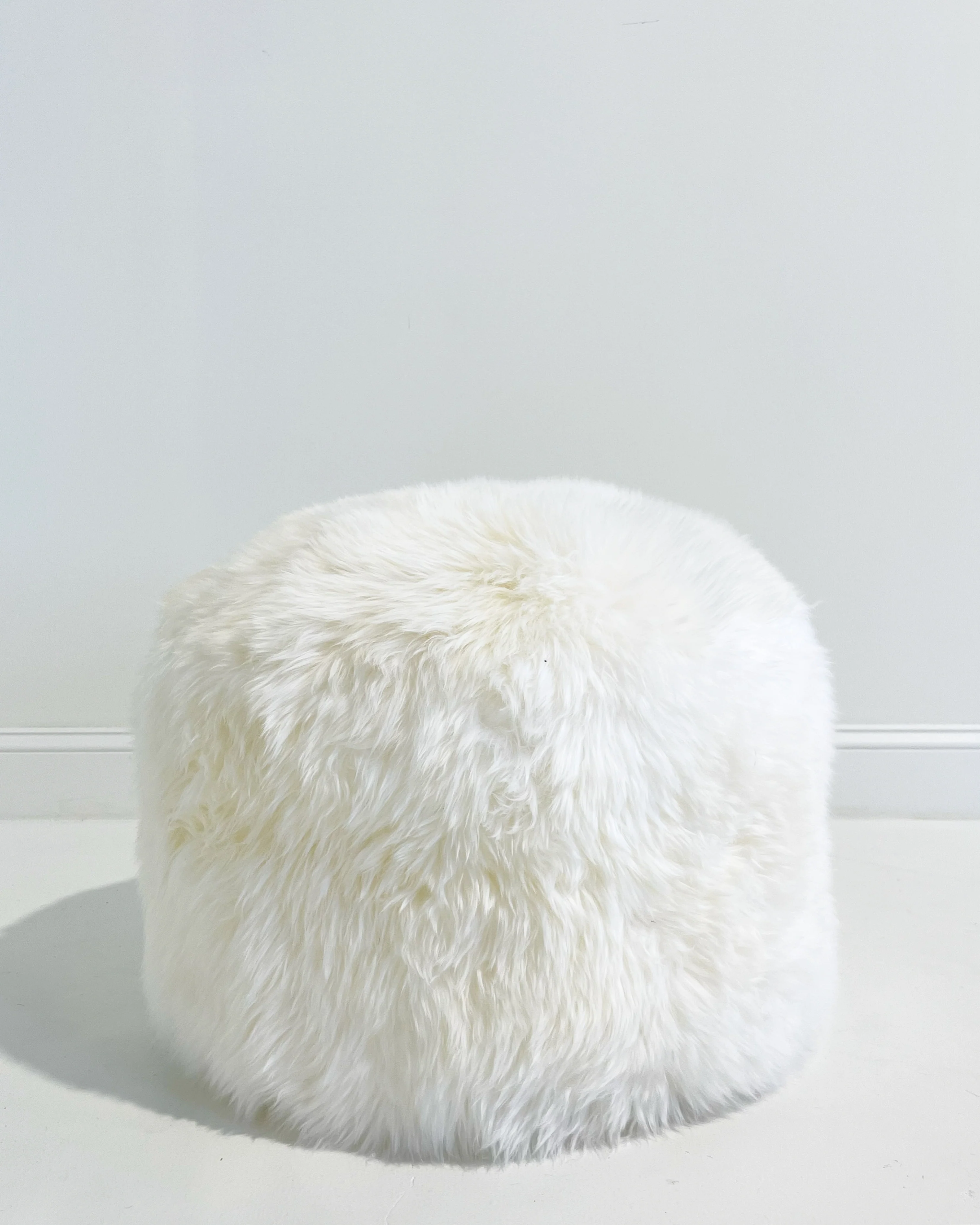 The Forsyth Pouf Ottoman in Sheepskin